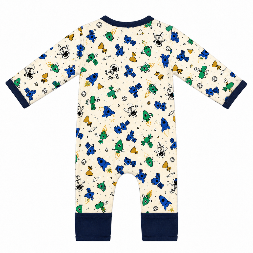 Millie and Me Space Rockets organic cotton baby romper, back view, featuring a colourful rocket and astronaut print in blue, green, yellow and navy on a cream background.