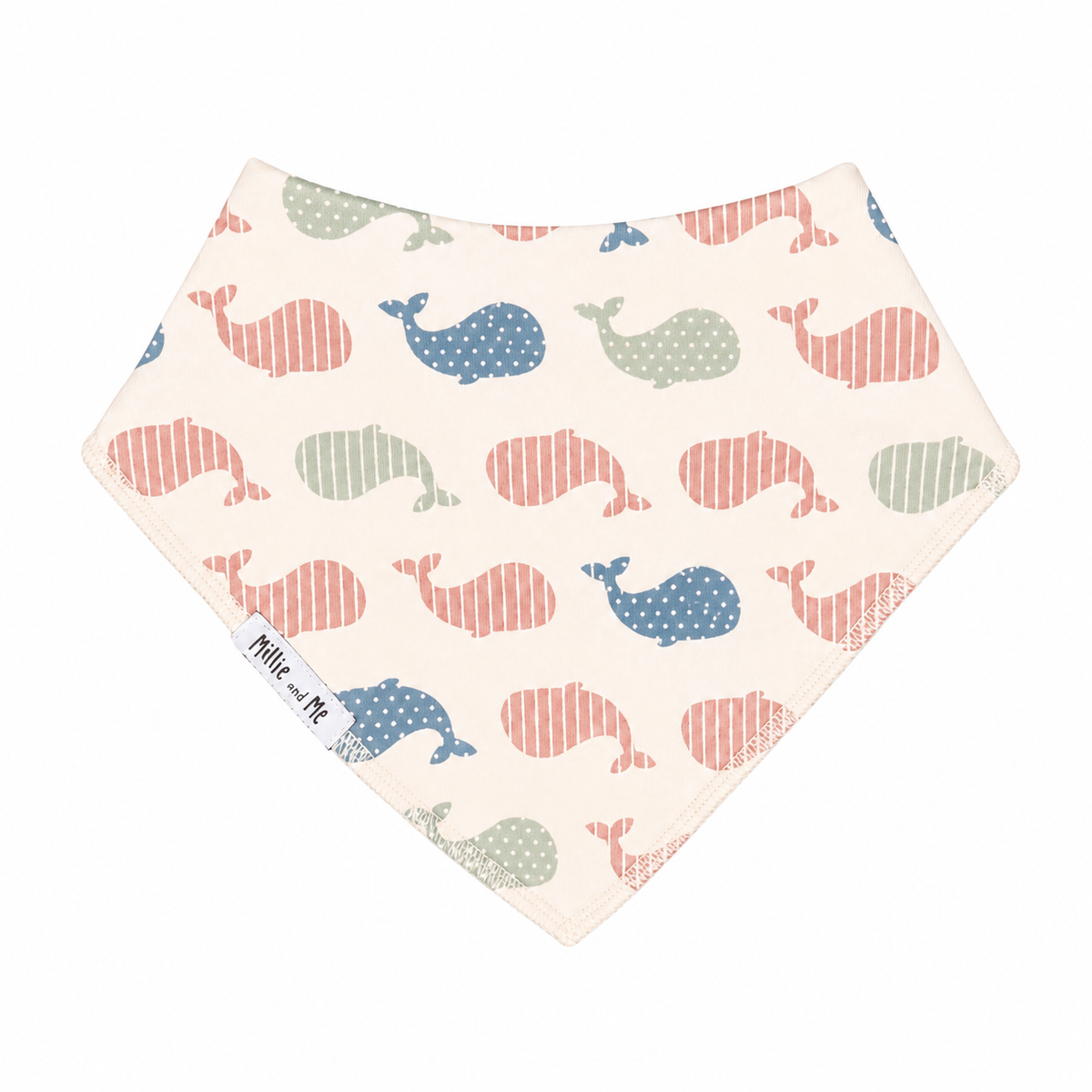 bandana bib with a pink and blue whale pattern on a cream background