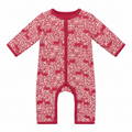 A long-sleeve baby footless one-piece romper in a red and white leaf print with a subtle deer pattern, shown flat on a white background.